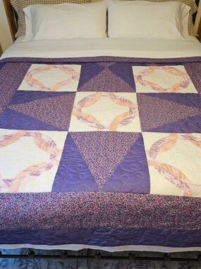 Homemade Purple Patchwork Quilt With Cross-stitch Detail
